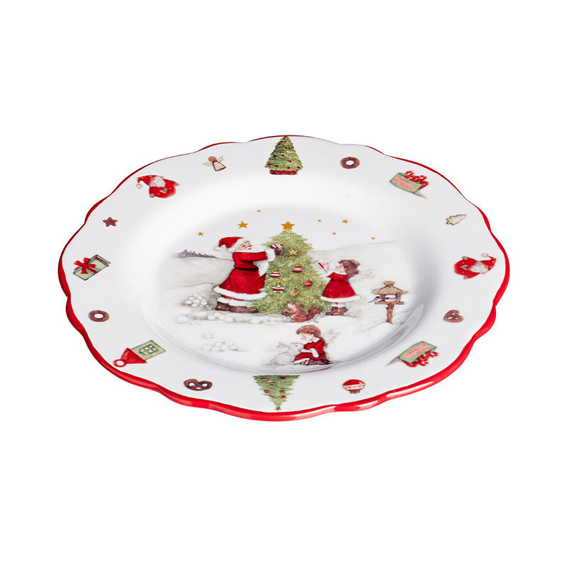 Dekorative Dessertteller mit traditionellem Weihnachtsdekor