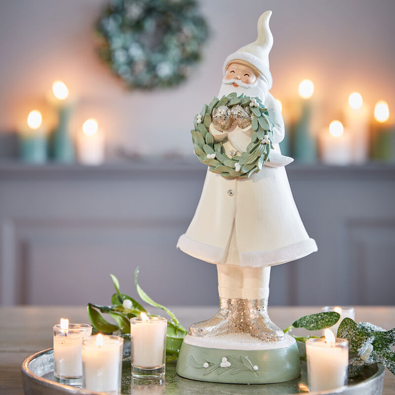 Fr�hlicher Weihnachtsmann im edlen Outfit