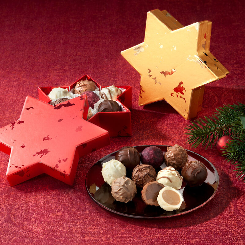 Exquisite handgefertigte Tr�ffelpralinen in weihnachtlicher Sternschachtel Bild 2