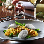 Fischkl��chen in Safransauce mit Spaghettini